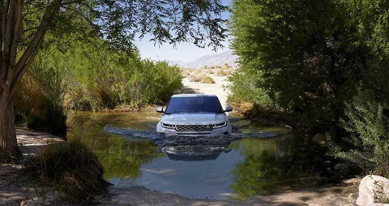 Land Rover Evoque fording a river